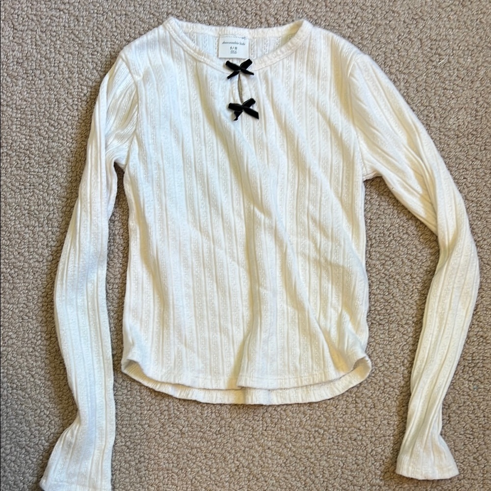 White Long Sleeve Top with Black Accents